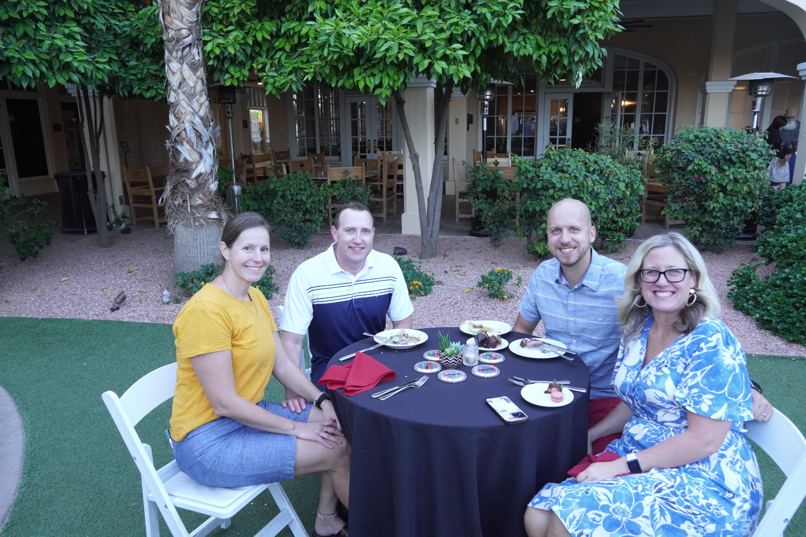 Members at an outdoor dinner at a past iGo event